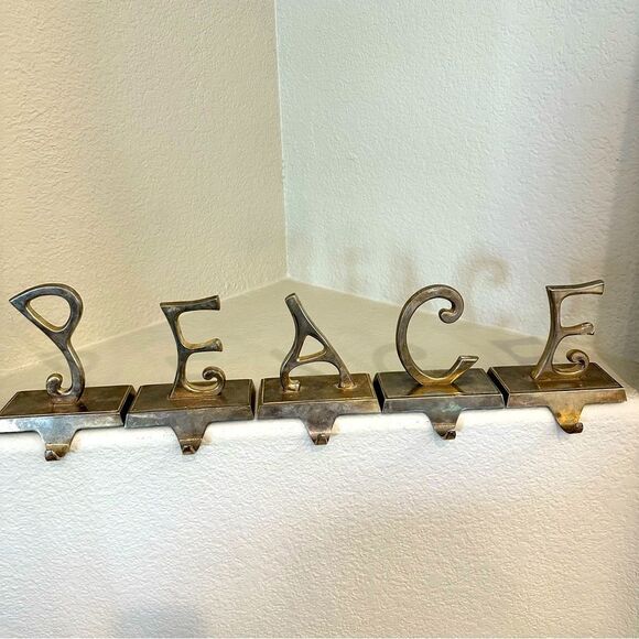 Pottery PEACE Christmas Stocking Holders - Picture 1 of 6